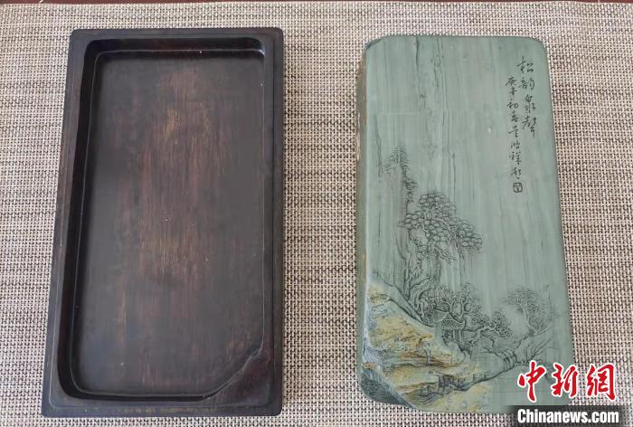 圖為盧保勝為提升洮硯文化內(nèi)涵，制作“一硯一銘、一盒一拓”成品展示?！堟?攝